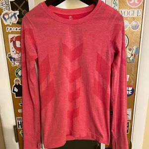 Pink long sleeve GAP athletic shirt.